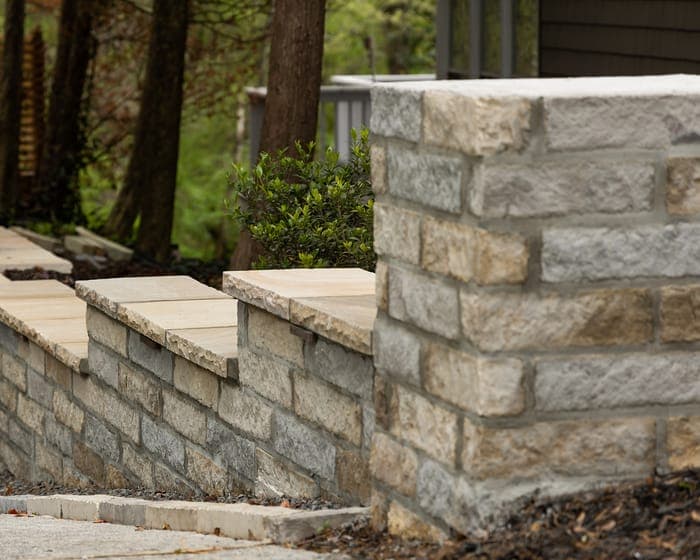 Retaining wall stone pillar capstone